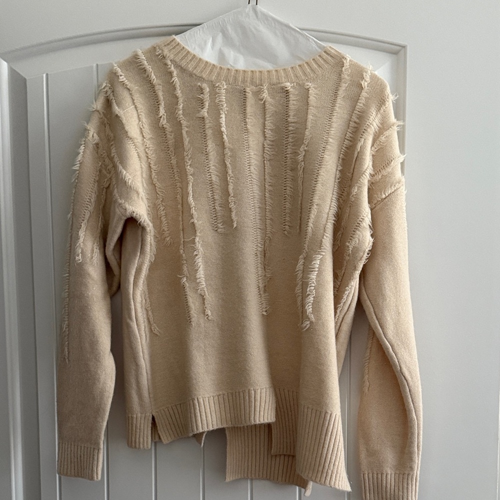 Elegant Cream Distressed Sweater